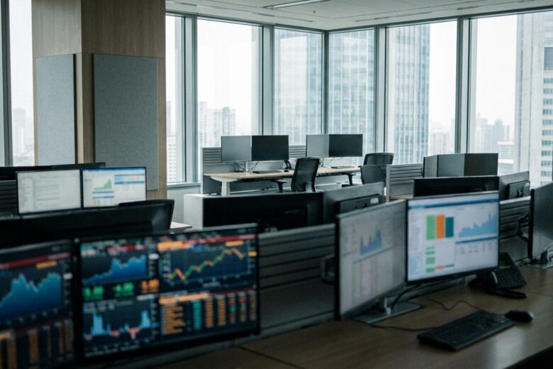 Bank trading floor with financial data screens showing interest rate information